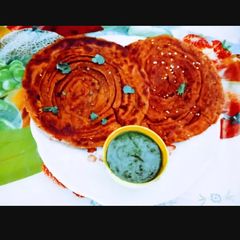 A picture of Tasty crisp soft Laccha Paratha with kasuri methi and sesame seeds.