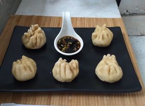 Una foto de Baozi o dumplings