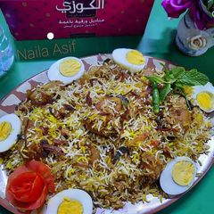 A picture of Chicken Aalo Biryani.