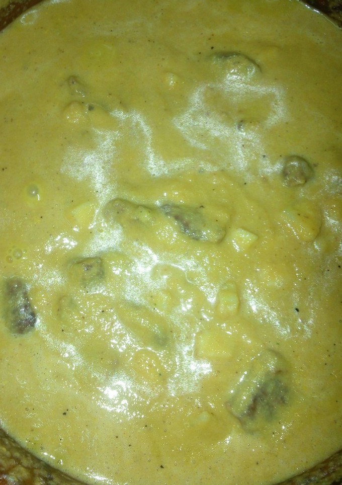 Una foto de Lomo de cerdo en salsa de zanahoria y papa a la Mario, s