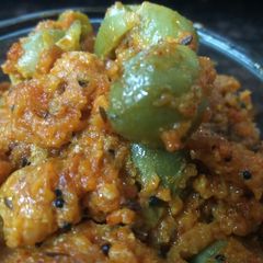 A picture of Gum berry (gunda) and raw mango sabji.