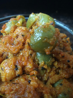 A picture of Gum berry (gunda) and raw mango sabji.