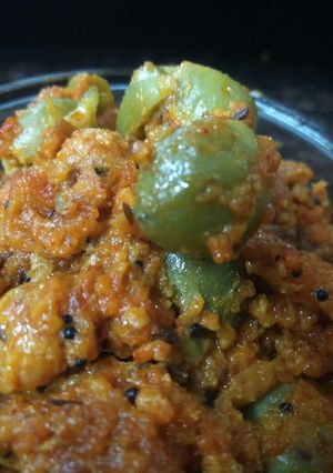 A picture of Gum berry (gunda) and raw mango sabji.