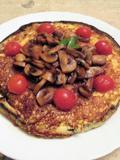 Una foto de Tortilla de queso rallado