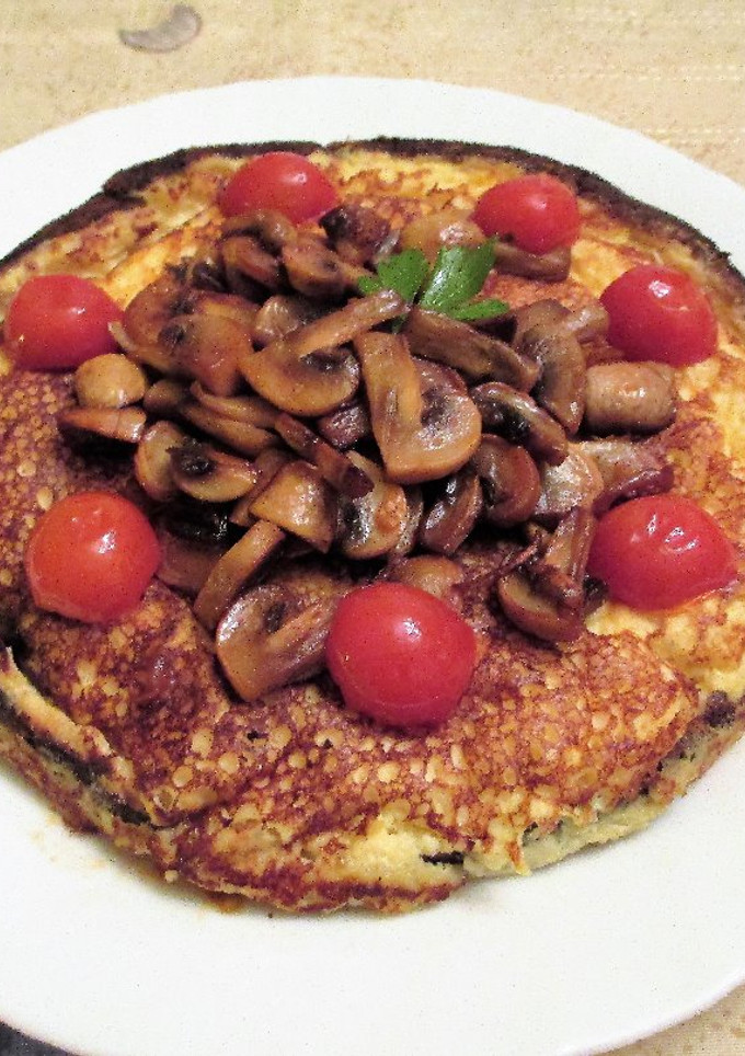 Una foto de Tortilla de queso rallado