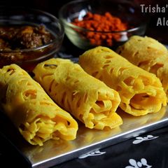Roti Jala (Malaysian Net Crêpes) A picture of Roti Jala (Malaysian Net Crêpes).