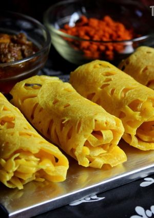A picture of Roti Jala (Malaysian Net Crêpes).