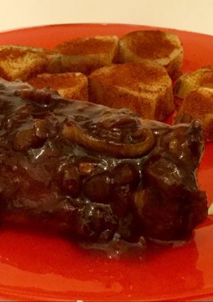 Una foto de Carre de Cerdo con salsa barbacoa al malbec