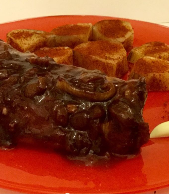 Una foto de Carre de Cerdo con salsa barbacoa al malbec