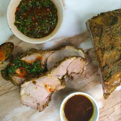 A picture of Roasted leg of lamb and chimichurri.