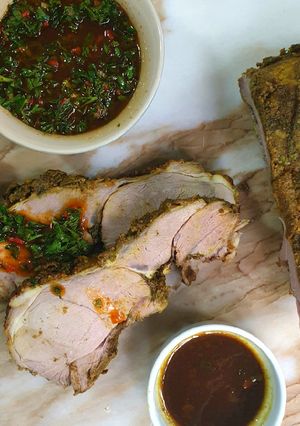 A picture of Roasted leg of lamb and chimichurri.
