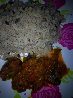 A picture of RICE AND BEANS WITh FISH SOURCE.