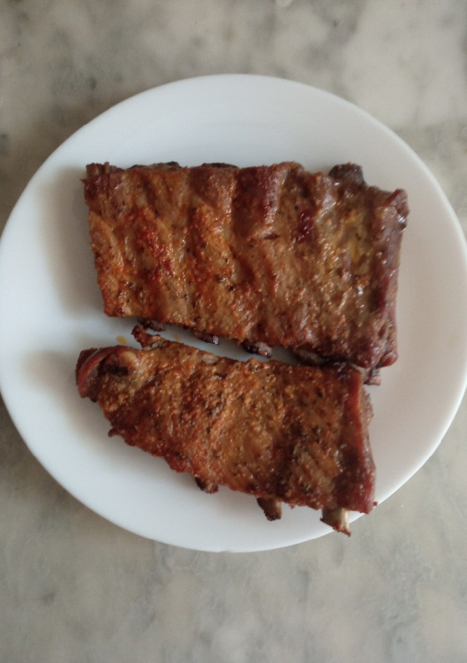 Una foto de Costillas de cerdo al horno súper tiernas y sabrosas