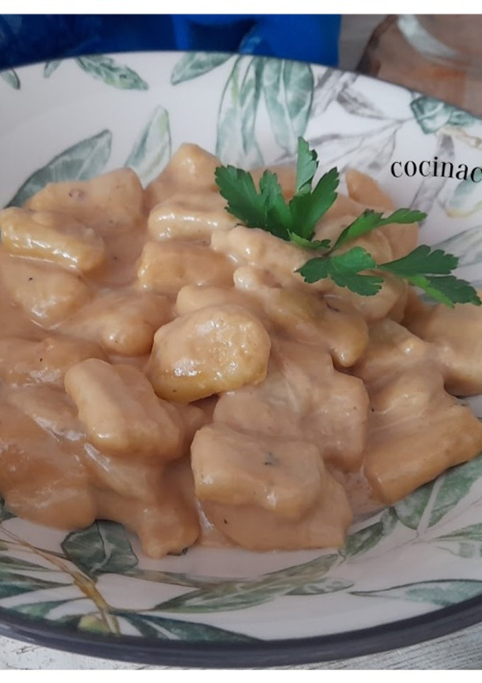 Una foto de Ñoquis caseros con salsa de queso