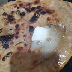 A picture of Busri (ghuur wala paratha).