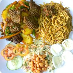 A picture of Pasta/potatoes with offals.