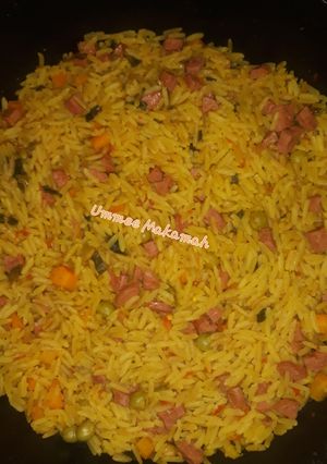A picture of Fried Rice with Sausages.