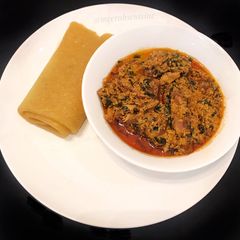 Rolled Eba and egusi soup A picture of Rolled Eba and egusi soup.