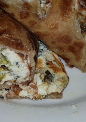 A picture of Moist cherry tomato sukuma wiki egg wrap.