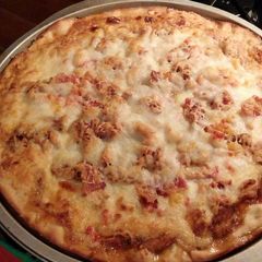 A picture of Jamaican Jerk Chicken Pizza.