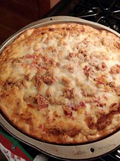 A picture of Jamaican Jerk Chicken Pizza.
