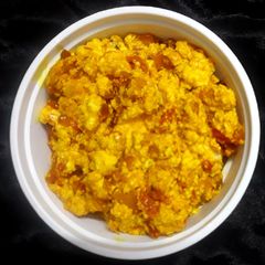 A picture of Tomato paneer.