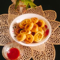 A picture of Pinwheel samosa 😋(party snacks pinwheel samosa 😋).