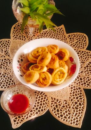 A picture of Pinwheel samosa 😋(party snacks pinwheel samosa 😋).