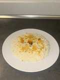 Risotto alla scamorza con crema di arancia e chips di parmigiano