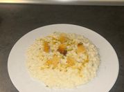 Una foto di risotto scamorza