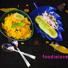 A picture of Mixed veg pulao with cucumber salad and raita.