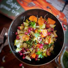 A picture of Sprouts and fruits salad.