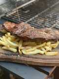 Arrachera al asador con papas