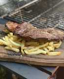 Arrachera al asador con papas
