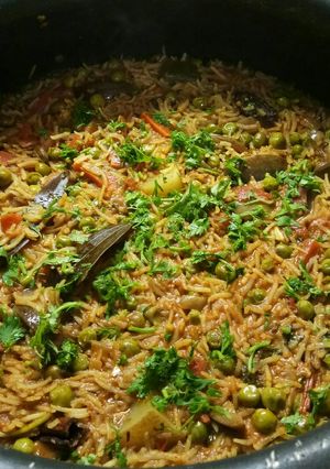 A picture of Vangi bhat (Brinjal masala rice).