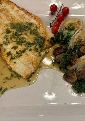 A picture of Pan Fried Fish with Basil Lemon Sauce.