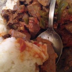 A picture of Stewed liver with rice.