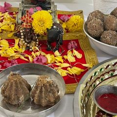 A picture of Modak and Ladoo (Whole wheat flour).
