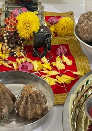 A picture of Modak and Ladoo (Whole wheat flour).