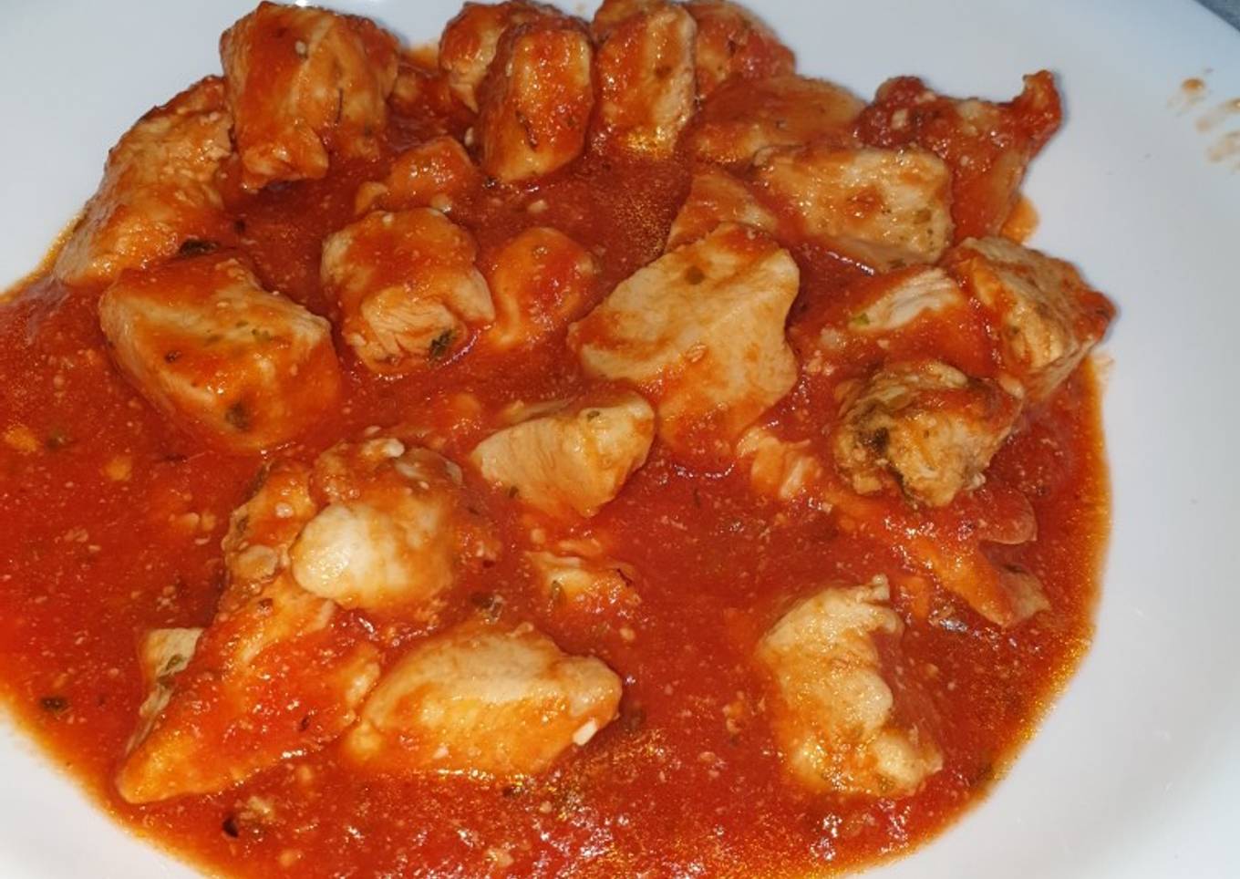 Carne con tomate