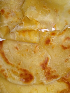 A picture of Soft layered Carrot chapatis.