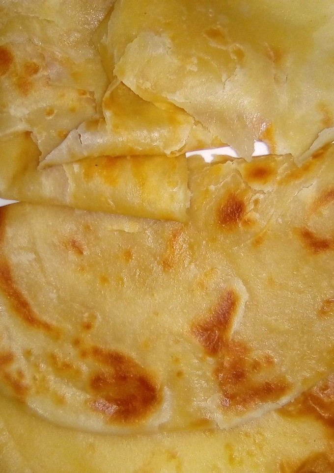 A picture of Soft layered Carrot chapatis.