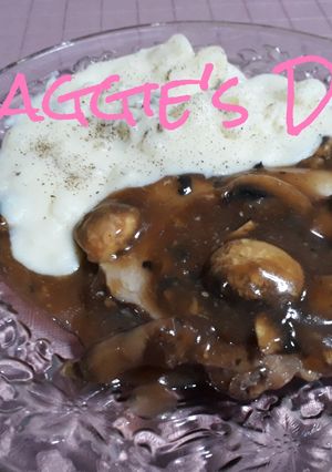 Una foto de Chuletas en salsa de ostión y champiñones