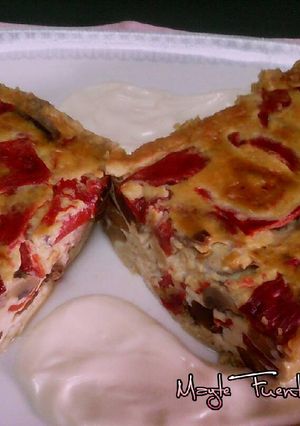 Una foto de Pastel de níscalos, champiñónes y piquillos