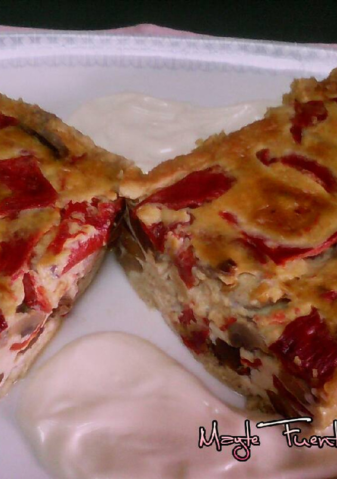 Una foto de Pastel de níscalos, champiñónes y piquillos