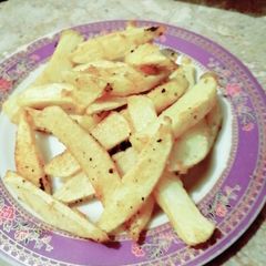 A picture of Potato wedges.