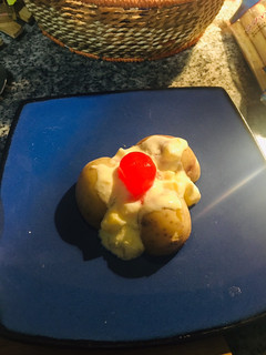 Una foto de Papas con crema de piña