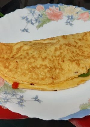 Una foto de Tortilla de fritada de pimientos y cebolla