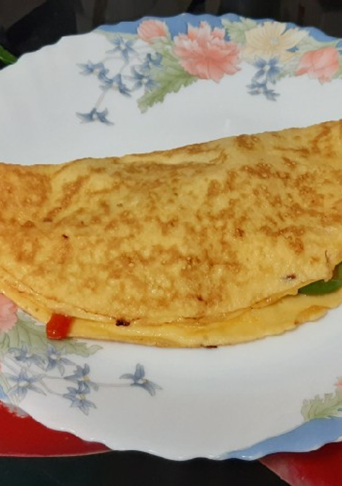 Una foto de Tortilla de fritada de pimientos y cebolla
