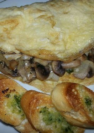 Foto principal de Tortilla de huevos, bacalao y champiñones